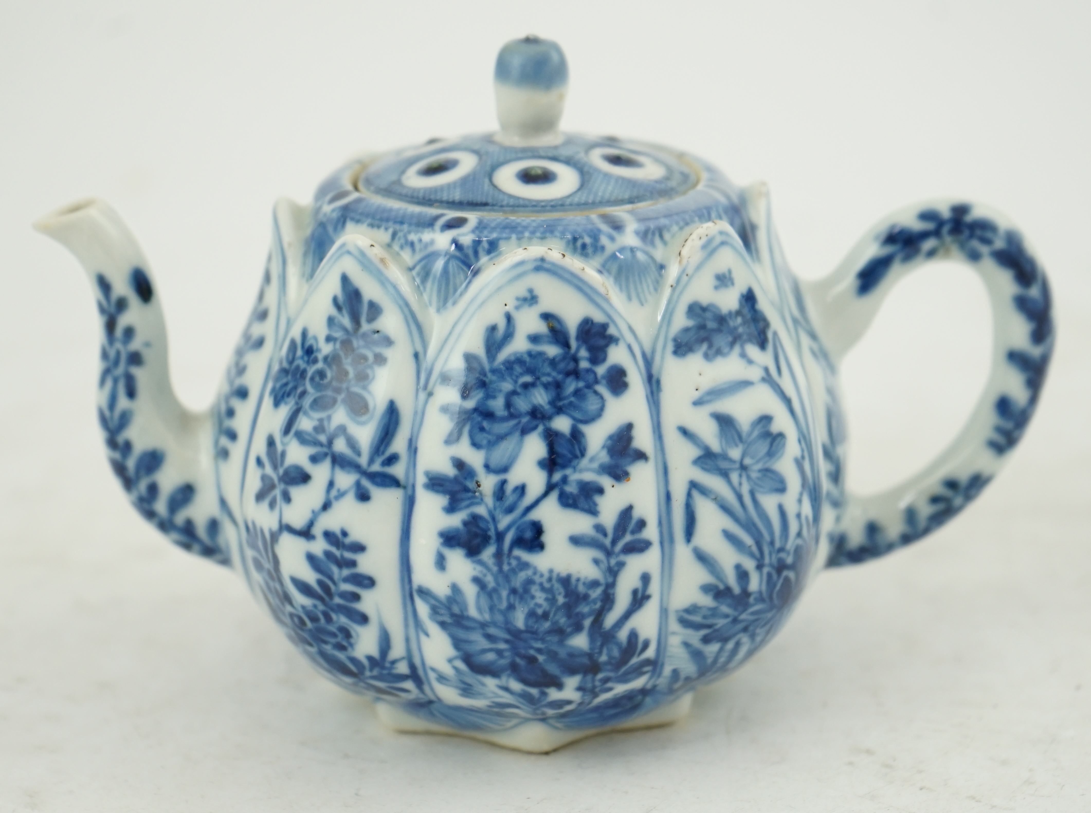 A Chinese blue and white lotus pod-shaped teapot and cover, Kangxi period